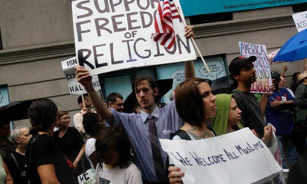 Supporters of a Islamic cultural center and mosque planned to be built near Ground Zero in lower Manhattan chant slogans and carry signs during a demonstration on August 22, 2010 in New York, NY.