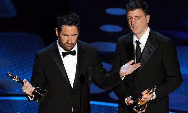 Atticus Ross (R) and Trent Reznor, winners of the Oscar for Best Original Score Composers Atticus Ross (R) and Trent Reznor, winners of the award for Best Original Score for 'The Social Network' accept their award on stage at the 83rd Annual Academy Awards