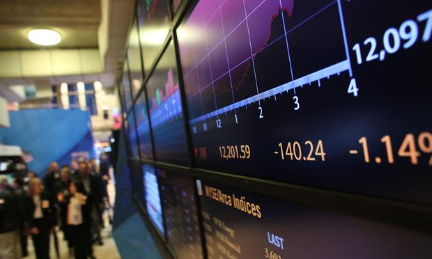 Following news that Standard and Poor's had cut its long-term outlook on U.S. debt to negative, the Dow Jones industrial average (INDU) fell 180 points