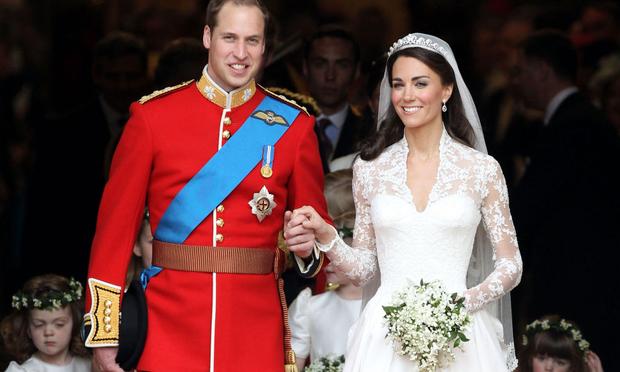 Prince William, Duke of Cambridge and Catherine, Duchess of Cambridge smile following their marriage at Westminster Abbey.