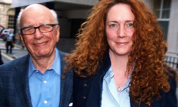 Rebekah Brooks (R) Chief Executive of News International and Rupert Murdoch Chairman of News Corporation leave from his London residence shortly after his arrival in Britain on July 10, 2011.