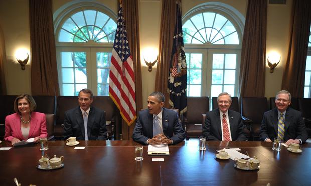 President Barack Obama takes part in a debt meeting with congressional leaders July 13, 2011 in the Cabinet Room of the White House in Washington, DC.