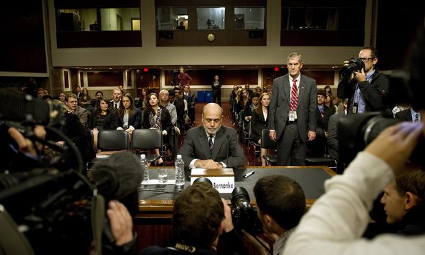 Federal Reserve Chairman Ben Bernanke arrives to testify before the Joint Economic Committee on Capitol Hill in Washington, DC, October 4, 2011.