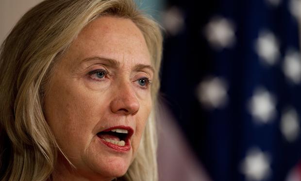 Hillary Clinton delivers remarks with U.S. Secretary of Treasury Tim Geithner.
