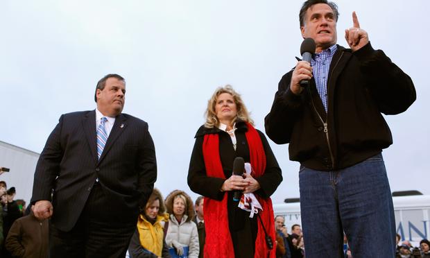 Mitt Romney addresses a campaign rally with New Jersey Governor Chris Christie. Former Massachusetts Governor and Republican presidential candidate Mitt Romney (R) addresses a campaign rally with his wife Ann Romney (C) and New Jersey Governor Chris Christie at a Hy Vee supermark