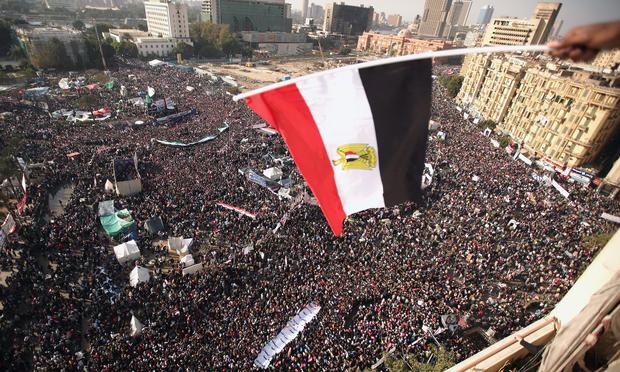 Tahrir Square on the one year anniversary of the revolution. Egyptians gather in their thousands in Tahrir Square to mark the one year anniversary of the revolution on January 25, 2012 in Cairo Egypt
