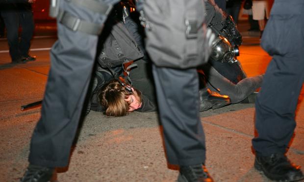 A protester from Occupy Oakland -the local offshoot of Occupy Wall Street- is arrested in Oakland on January 28, 2012.