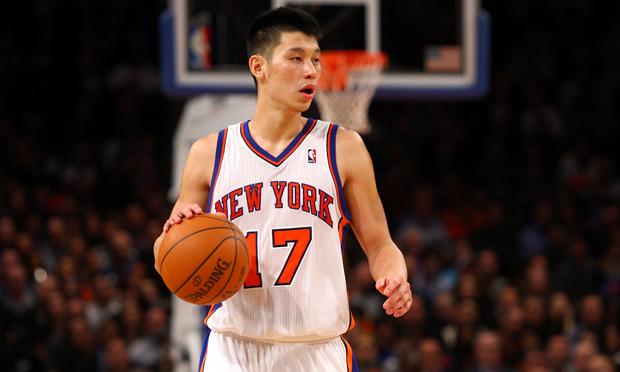 Jeremy Lin of the New York Knicks brings the ball up court against the Los Angeles Lakers.