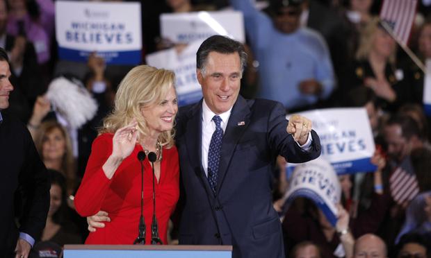 Mitt Romney and his wife Ann wave to supporters at a primary night gathering. Republican presidential candidate and former Massachussetts Gov. Mitt Romney (R) and his wife Ann wave to supporters at a primary night gathering at the Suburban Collections Showplace on February 28,