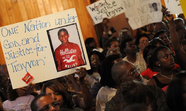 Civil rights leaders and residents of the city of Sanford, FL attend a town hall meeting to discuss the death of a 17-year-old unarmed black teen Trayvon Martin.