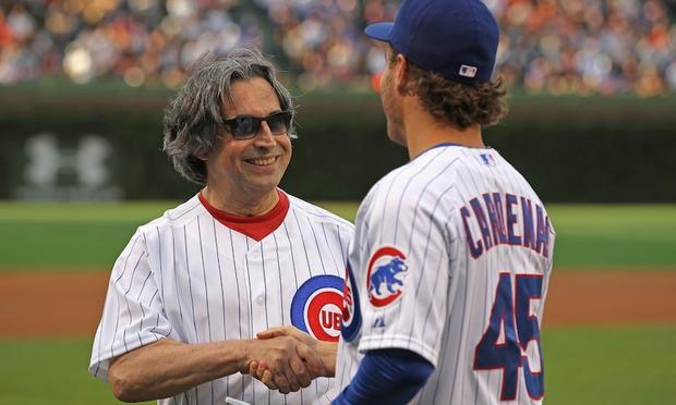 Conductor Riccardo Muti shakes hands with Adrian Cardenas of the Chicago Cubs after throwing out a first pitch at Wrigley Field Conductor Riccardo Muti shakes hands with Adrian Cardenas of the Chicago Cubs after throwing out a first pitch at Wrigley Field