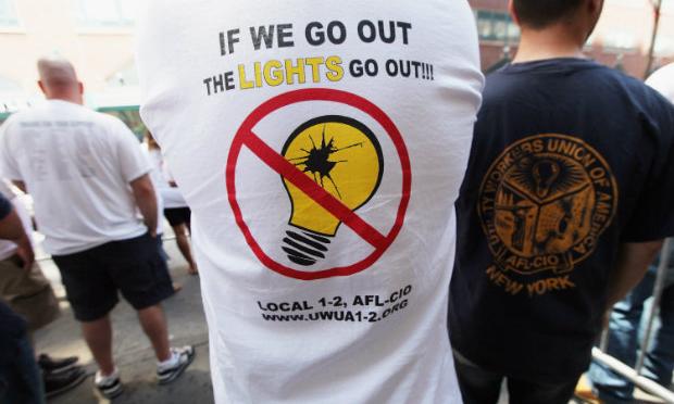 Union workers at power company Con Edison picket outside company headquarters.