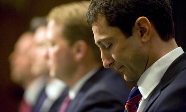 Fabrice Tourre (R) prepares to testify on Capitol Hill in April, 2010.