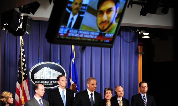US Attorney General Eric Holder (C) answers a question during a press briefing regarding the investigation into the Times Square attempted bombing, in Washington, DC, on May 4, 2010.