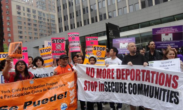 Immigration advocates protest the activation of Secure Communities.