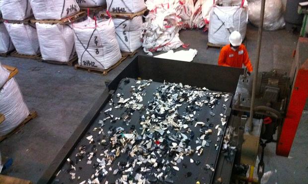 After shredding, the chewed-up pieces of computers and other e-waste are sorted by magnets and other machines.