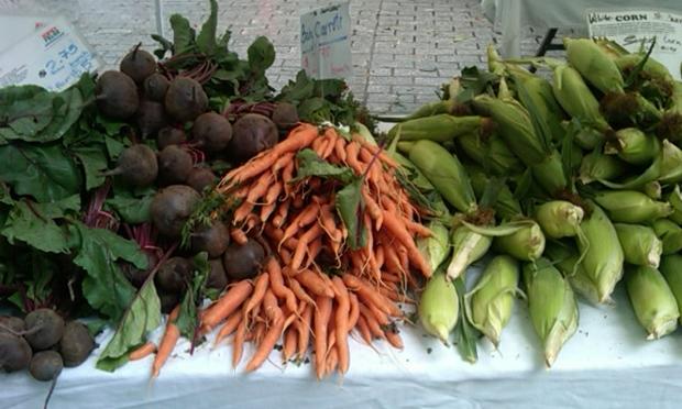 Vegetables on display at the farmers market at Bowling Green on July 19. farmers market, produce, vegetables, groceries