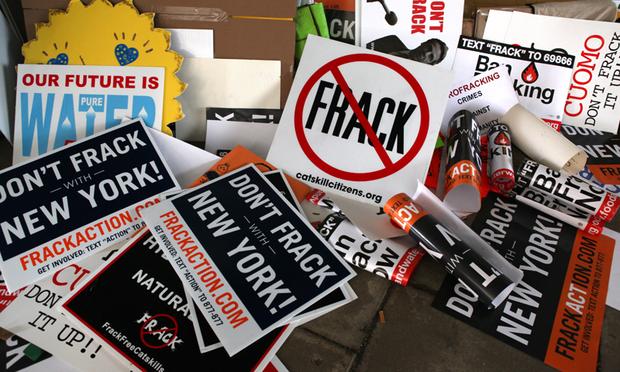 Anti-fracking sign at the final of four public hearings in New York city on the controversial practice known as hydraulic fracturing. fracking, hydraulic fracturing, frack