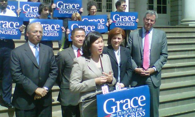 Assemblywoman Grace Meng, flanked by Public Advocate Bill de Blasio, Comptroller John Liu, City Council Speaker Christine Quinn, and former comptroller Bill Thompson at City Hall. (Brigid Bergin/WNYC)