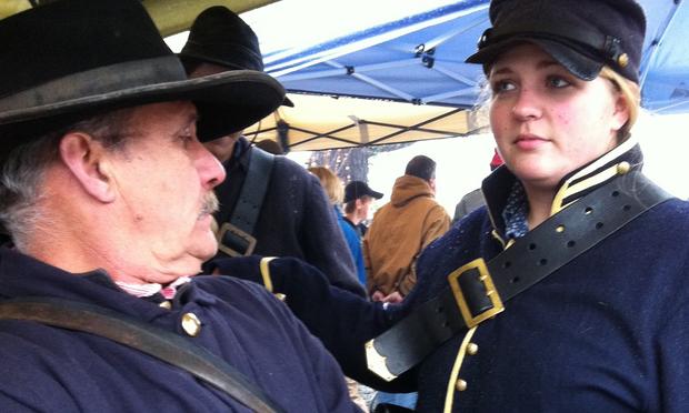 Re-enactor Michael Cheaves prepares for battle alongside his daughter, Sarah. Siege at Bridgeport, Civil War Re-enactors