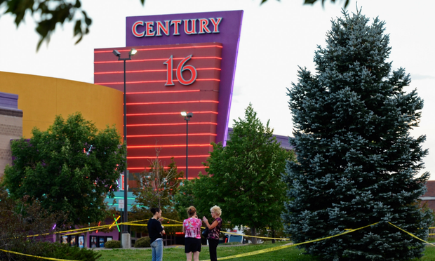 People stand in the parking lot outside the Century 16 movie theater where 12 people were killed in a shooting rampage on July 20 in Aurora, Colorado People stand in the parking lot outside the Century 16 movie theater where 12 people were killed in a shooting rampage on July 20 in Aurora, Colorado