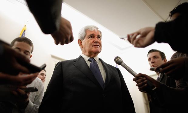 Former Speaker of the House Newt Gingrich (R-GA) talks with reporters after a meeting in the Longworth House Office Building on Capitol Hill March 31, 2011 in Washington, DC.