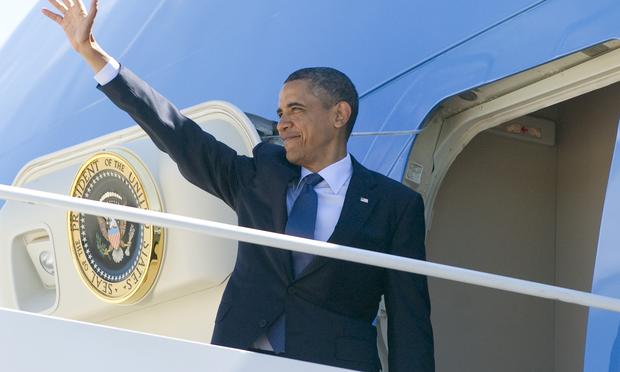 President Obama boards Air Force One on a speaking and fundraising tour that includes a stop in Puerto Rico.