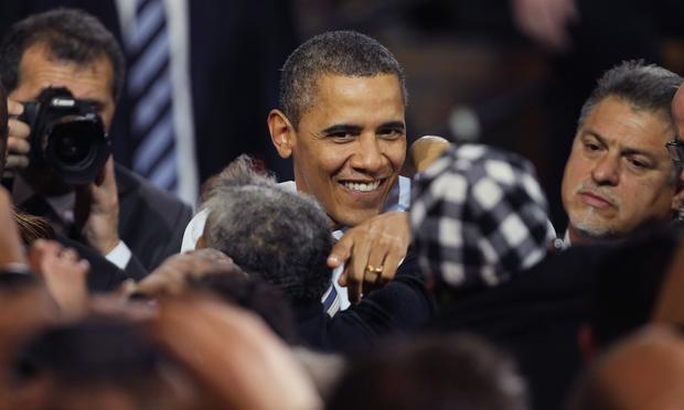 President Barack Obama greets workers following a speech at the Master Lock factory on February 15, 2012 in Milwaukee, Wisconsin.