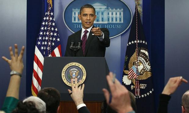 President Obama held his first news conference of the year on Super Tuesday as his Republican rivals battled for votes in 10 states.