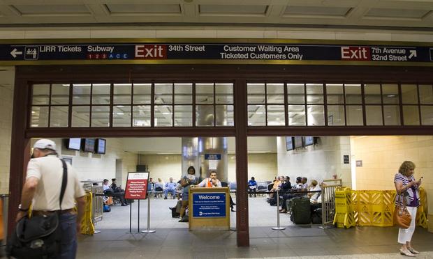 This steel and glass doorframe is the sole remnant of the old Penn Station, opened in 1910 and demolished in 1963, to be found in the new.