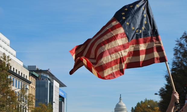 Betsy Ross Flag flies above the Rally to Restore Sanity and/or Fear; Washington, DC, Oct. 30, 2011