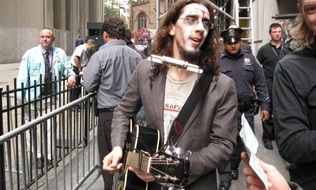 Gio Andollo, who performs as Gio Safari, at Occupy Wall Street on Monday. Gio Andollo, who performs as Gio Safari, at Occupy Wall Street on Monday.