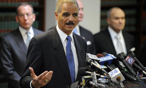 Attorney General Eric Holder attends a press conference at the US Attorney's Office in New York, January 20, 2011 Attorney General Eric Holder attends a press conference at the US Attorney's Office in New York, January 20, 2011
