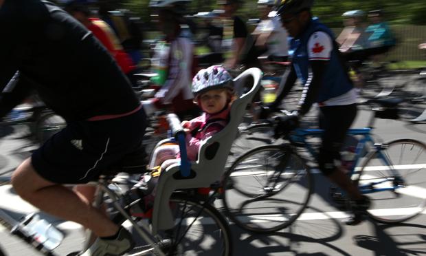 Bikers riding through Central Park in the 34th annual 5 Boro Bike Tour.