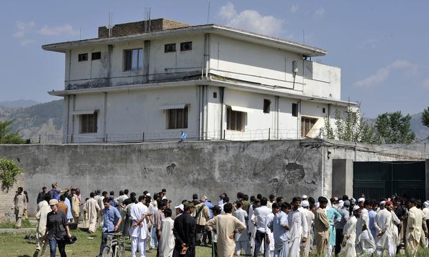 Pakistani media personnel and local residents gather outside the hideout of Al-Qaeda leader Osama bin Laden following his death by US Special Forces in a ground operation in Abbottabad on May 3, 2011. Pakistani media personnel and local residents gather outside the hideout of Al-Qaeda leader Osama bin Laden following his death by US Special Forces in a ground operation in Abbottabad on May 3, 2011.