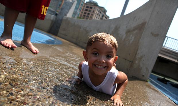 Cairo Rosa, 5, visiting the park near the Hudson River to cool off on a sweltering day in June, summer, heat, hot