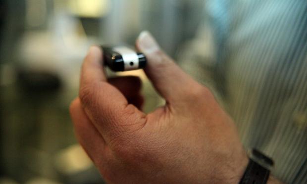 A cellphone with a hidden camera on the top.
