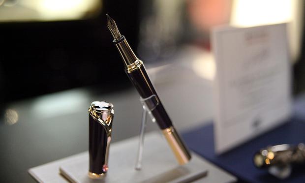A fountain pen with a gold nib on display at the Fountain Pen Hospital.