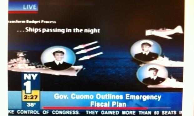 A slide from Andrew Cuomo's 2011 State of the State address depicting the budget process as three battleships captained by Cuomo, Skelos and Silver, and an air strike of special interests