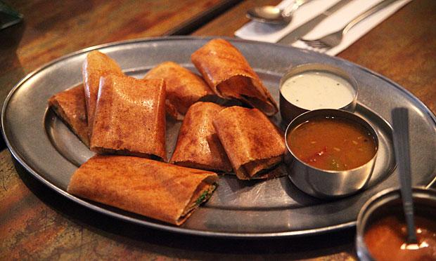 A cut up South Indian Dosa at Dosa Delight in Jackson Heights, Queens. A cut up South Indian Dosa at Dosa Delight in Jackson Heights, Queens.