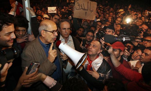 Opposition leader Mohamed ElBaradei waves to supporters in Tahrir Square on January 30, 2011 in Cairo, Egypt. Opposition leader Mohamed ElBaradei waves to supporters in Tahrir Square on January 30, 2011 in Cairo, Egypt.