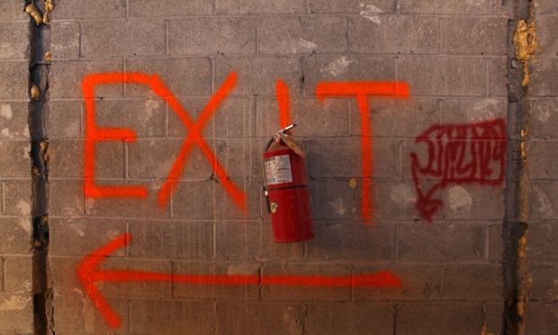 Well marked exit signs at the Deutsche Bank building in lower Manhattan where there are only a few stories left to demolish.