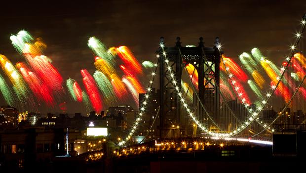 A view of the bridge: Macy's 4th of July fireworks light up the Manhattan Bridge. A view of the bridge: Macy's 4th of July fireworks light up the Manhattan Bridge.