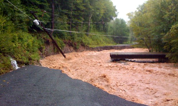 Flooded road in the Catskills on Burnham Hollow Road after Hurricane Irene. Flooded road in the Catskills on Burnham Hollow Road after Hurricane Irene.
