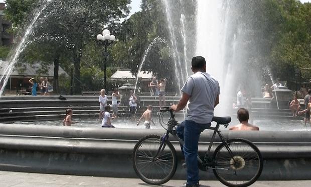 The fountain at Washington Square Park offers a pleasant respite from the heat. The fountain at Washington Square Park offers a pleasant respite from the heat.