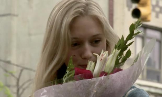 girl smells flowers