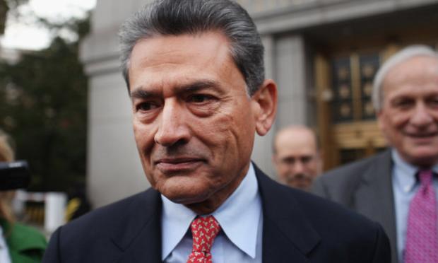 Rajat Kumar Gupta, former Goldman Sachs board member, leaves a Manhattan court after surrendering to federal authorities October 26, 2011.