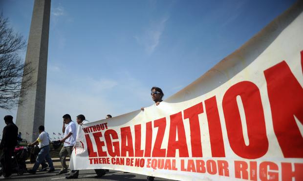 Protestors participate in a 'March For America' demonstration calling for immigration reform near the Washington Monument March 21, 2010 in Washington, DC. Protestors participate in a 'March For America' demonstration calling for immigration reform near the Washington Monument March 21, 2010 in Washington, DC.