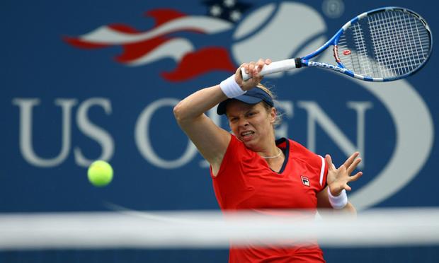 Kim Clijsters of Belgium returns a shot against Venus Williams. 58251460