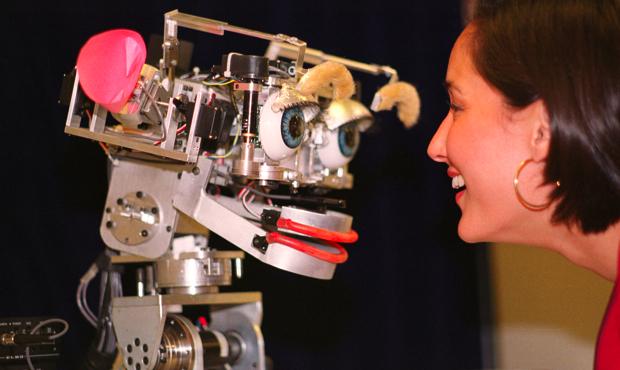 Kismet with Cynthia Breazeal, postdoctoral fellow at the MIT Artificial Intelligence Lab working in the Humanoid Robotics Group. Anne Foerst worked with Breazeal on designing the robot.' Studio 360 Episode 911, Murakami, Big Eyes, Stars
